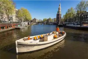 Boat Green Marine on canals near Westerkerk