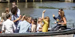 A group of people partying on a boat
