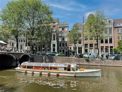 Saloon boat Pax sailing on the canals