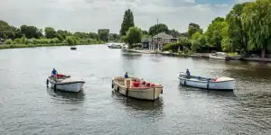 3 boats cruising in Haarlem